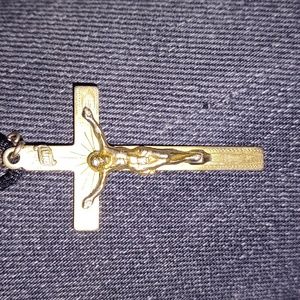 12 k gold cross pendent.